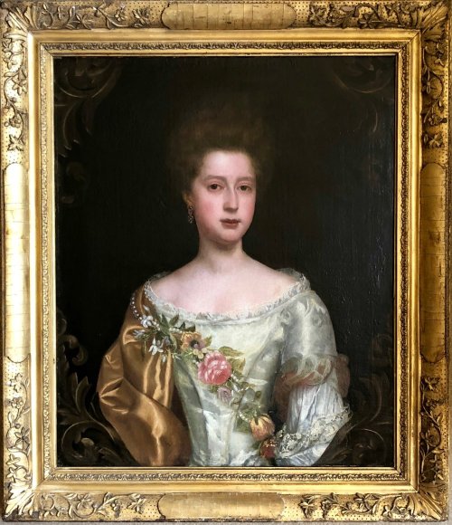 Portrait of a young lady wearing elaborate dress draped with a pearl and flower garland; attributed 