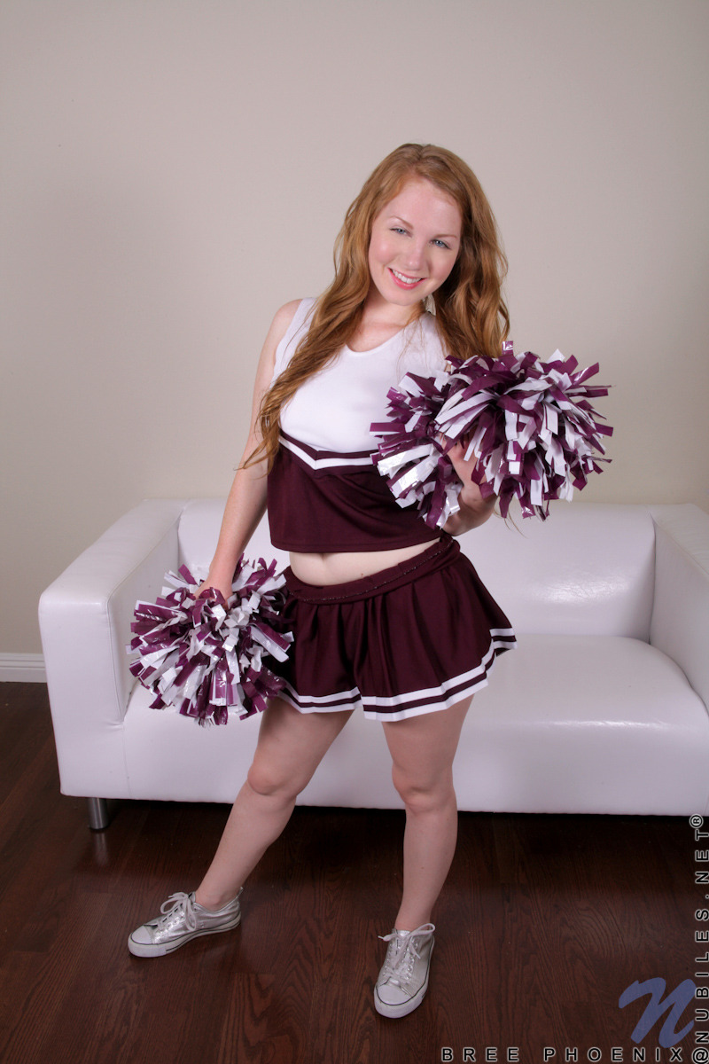 roarin-monkey:  Bree Phoenix Supple redhead teen cheerleader shakes off her outfit