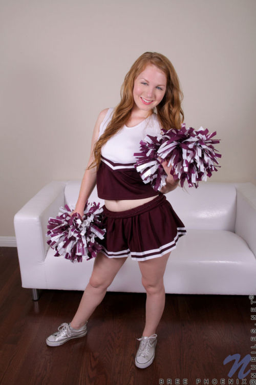 roarin-monkey:  Bree Phoenix Supple redhead teen cheerleader shakes off her outfit and quivers an orgasm out on her favorite purple toy. 