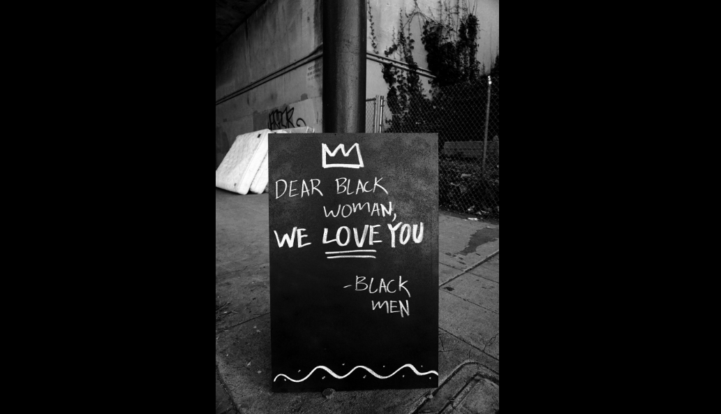 An anonymous person by the name of "Black Man" is putting these signs all
