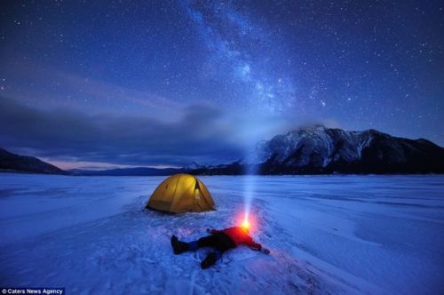 One man and his headlamp: Photographer travels to remotest parts of Canada to capture the Milky Way 