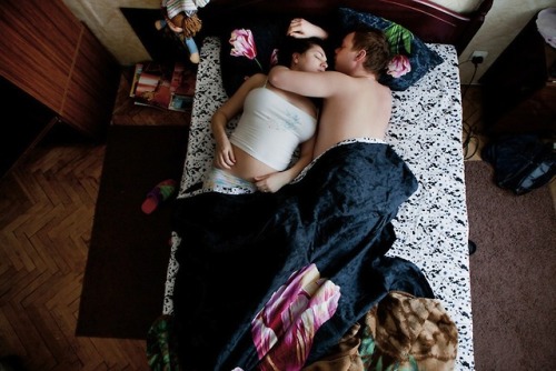  Jana Romanova a Russian photographer captures couples in their sleep to explore their cultural attitude inside their families. Since she didn’t want them to pose she had to stick around their house till they fall asleep deeply and she would take the