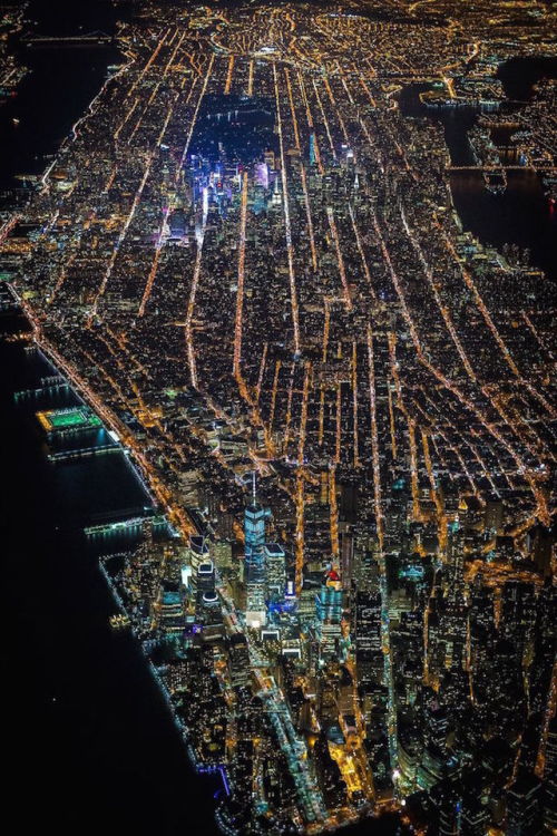 mymodernmet:  Renowned French American photographer Vincent Laforet recently embarked on the photo mission of a lifetime when he soared 7,500 feet in a helicopter above New York City to capture breathtaking aerial photos of the glittering cityscape at