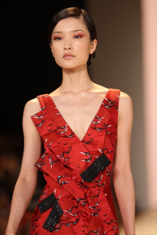 DU JUAN wearing CAROLINA HERRERA SPRING 2011 READY-TO-WEAR
