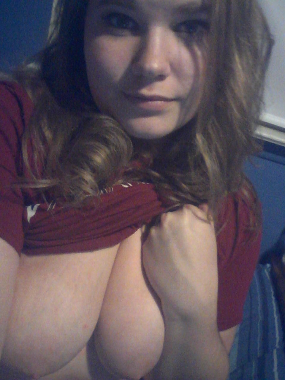 pigletpuffin:  Taking nudes In my high school scholar team shirt. I love that I’m