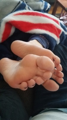 myprettywifesfeet:  My pretty wifes beautiful soles getting some rubs in my lap.please comment 
