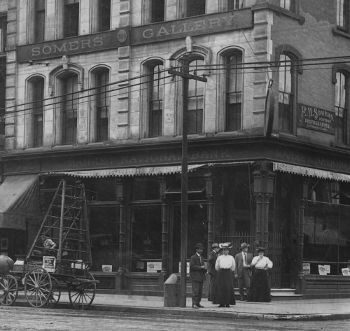 Designed by Samuel Hannaford, the H. W. Derby Building has served as a bank and a photography studio