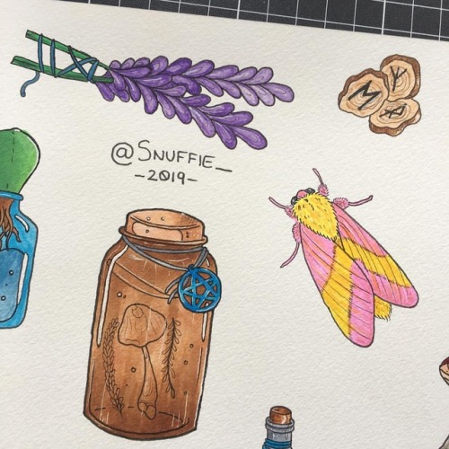 Some Lavender, runic log slices, rosy-maple moth and potion jar.www.instagram.com/p/BucVi8IH