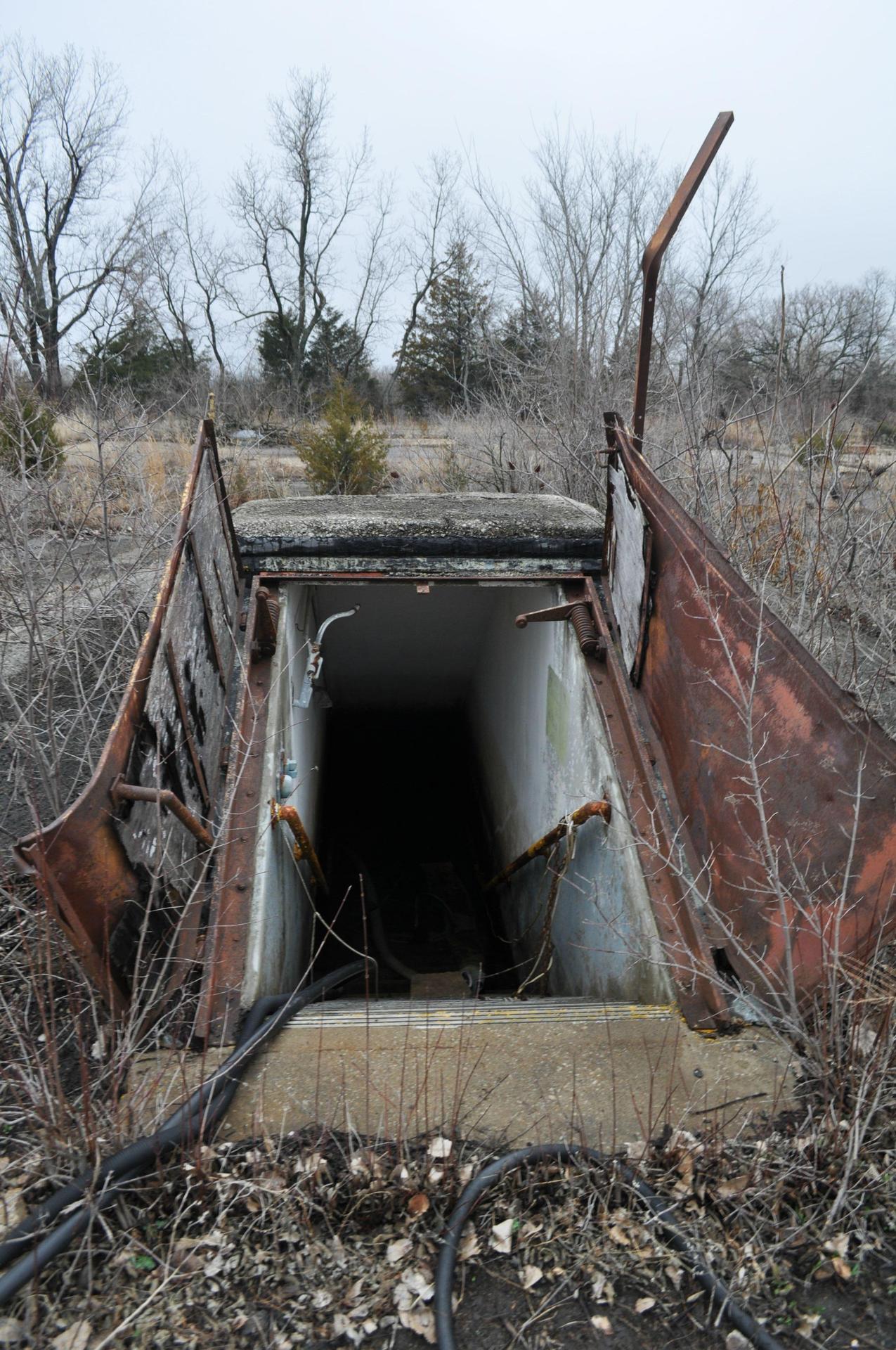 destroyed-and-abandoned:  Doors leading underground into an abandoned Nike missile