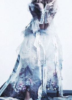 deprincessed:  Detail of Sasha Pivovarova in a frothy tulle wedding gown with flowerful details from the Christian Lacroix Haute Couture Spring/Summer 2006 collection all wrapped in a ribbon as seen in the editorial ‘Fa La Folie’ photographed by Craig