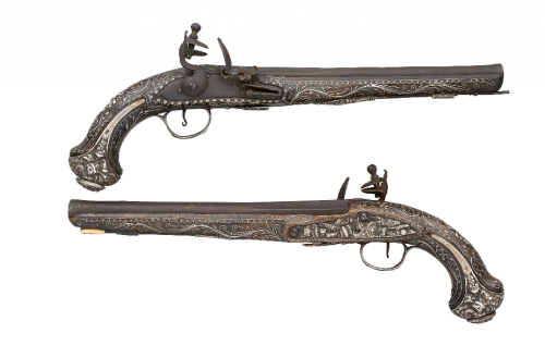 peashooter85:  Silver inlaid flintlock pistol originating from the Ottoman Empire, 19th century.