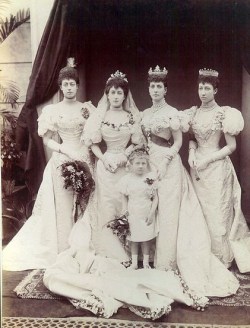 duchessoflancaster:  queenvictoriasfamily:  Maud of Norway’s wedding  LOOK AT VICTORIA AND MAUD’S WAISTS THOUGH OMFG (Toria is the last one on the left and Maud is the second from the left). 