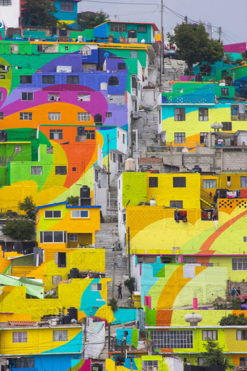 sixpenceee:  Mexican Government Asked Street Artists To Paint 200 Houses To Unite Community A youth organization that’s been known  to use graffiti as a means of expression has teamed up with the  government of Mexico to rehabilitate Palmitas, a town