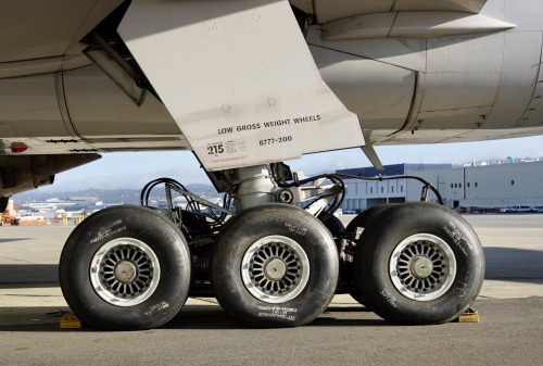 United Airlines 1996 Boeing 777-200 N781UA c/n 26945 left main gear. San Francisco Airport 2022.