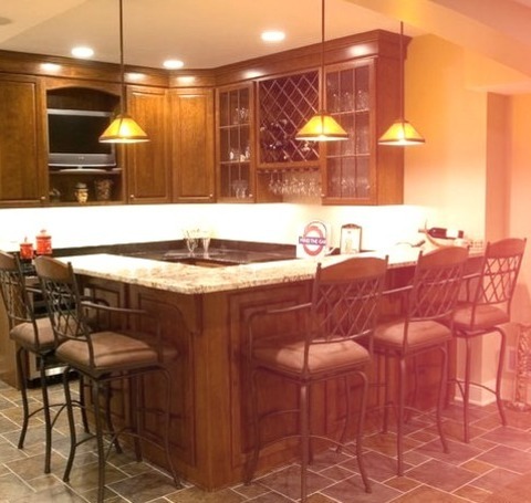 Large Elegant Underground Porcelain Tile Basement Photo With Beige Walls