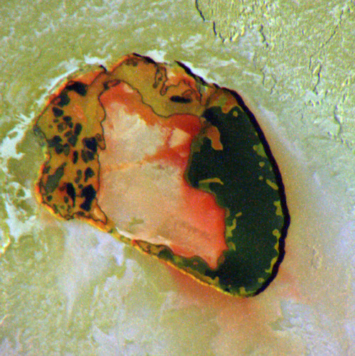 Io - The Volcanic MoonLooking like a giant pizza covered with melted cheese and splotches of tomato 