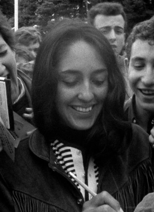 Joan Baez signing autographs at Newport Folk Festival 1964