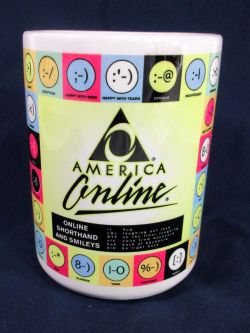 y2kaestheticinstitute:  America Online ‘Online Shorthand and Smileys’ coffee mug (1998) 
