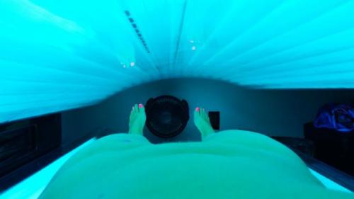 Tanning bed hotwife!! Look at her toes glow..lol