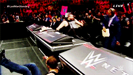 mithen-gifs-wrestling: Kevin Owens uses the opportunity to maul Michael Cole in his