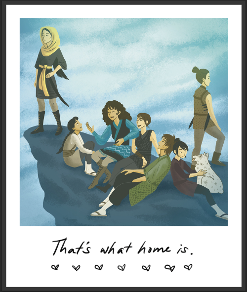 a faux "Polaroid" of dreamy washed out blue and green colors and seven characters perched on a rock: one in a yellow scarf staring off into the distance, another in a brown speckled vest with her back turned to the rest, another four gathered around one in a blue wrap regaling them with a story (one of those has a gray speckled dog); the text at the bottom "That's what home is." followed by seven hand-drawn hearts