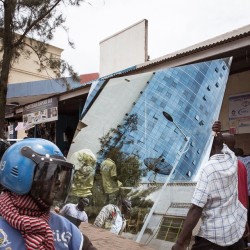 pulitzerfieldnotes:  A street scene in the capital city, Kigali. Rwanda’s urban population is predicted to grow two-and-a-half times greater than its current size by the year 2020. Rwanda already has the highest population density in Africa but in the