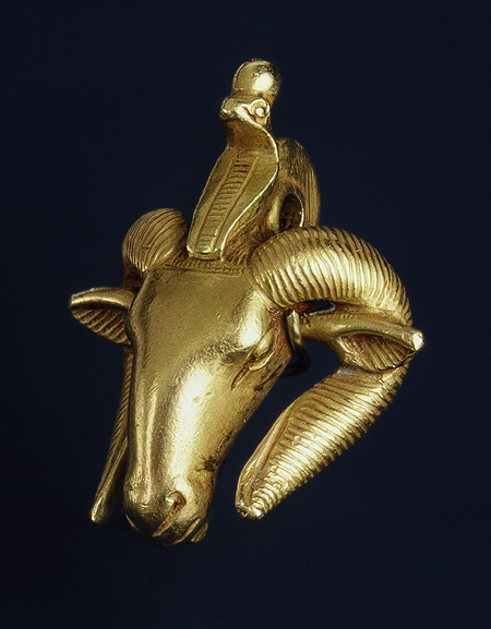 grandegyptianmuseum:Ram’s-head amulet This amulet was probably made for a necklace worn by one of th