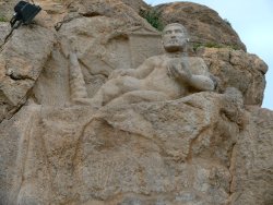 ancientart:  Heracles rock relief at Behistun, Province of Kermanshah, Iran.  According to its Greek inscription, the rock relief representing Heracles at Behistun was carved in 148 BCE , being dedicated to a local Seleucid governor. After the collapse