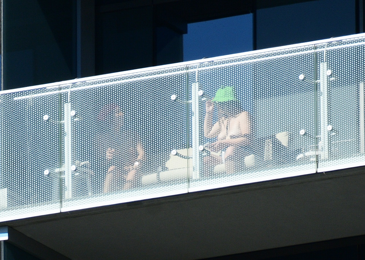 Saw these 2 girls way up at the Cosmo. Why is it the dude has clear glass and the