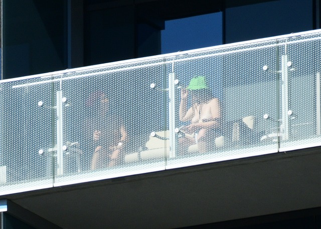 Saw these 2 girls way up at the Cosmo. Why is it the dude has clear glass and the