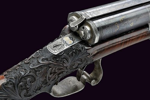 peashooter85:  A rare Dreyse pinfire double rifle originating from Germany, mid 19th century.  Beautifully & ornately engraved scroll work. -fms