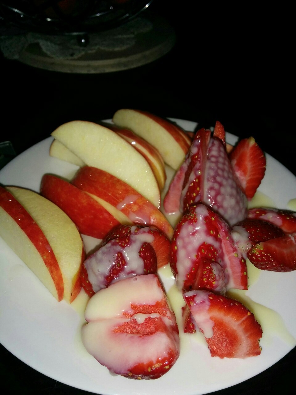 sungodprime:  Afternoon birthday snack, apple in the whiskey syrup and strawberries
