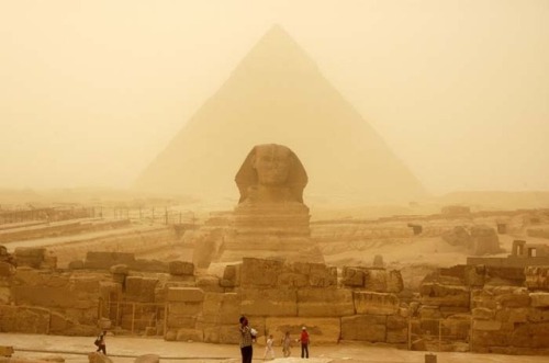 The Sphinx and the Pyramid of Khafre during a sandstorm.  Khafre ruled from c. 2558 - 2532 BC, durin