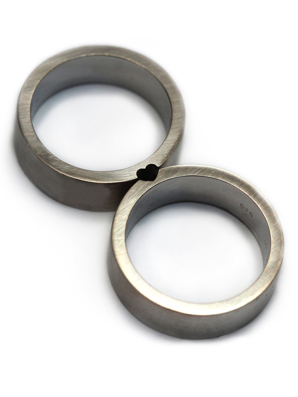 culturenlifestyle:  Puzzle Piece Wedding Bands Couple turned business partners  Eliad