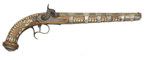 Ornate ivory, brass, and silver decorated percussion pistol originating from mid 19th century Persia