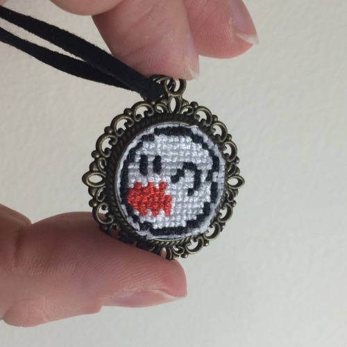 Teeny Boo NecklaceHe looks spooky, but he’s really shy, it’s Boo from Super Mario World!