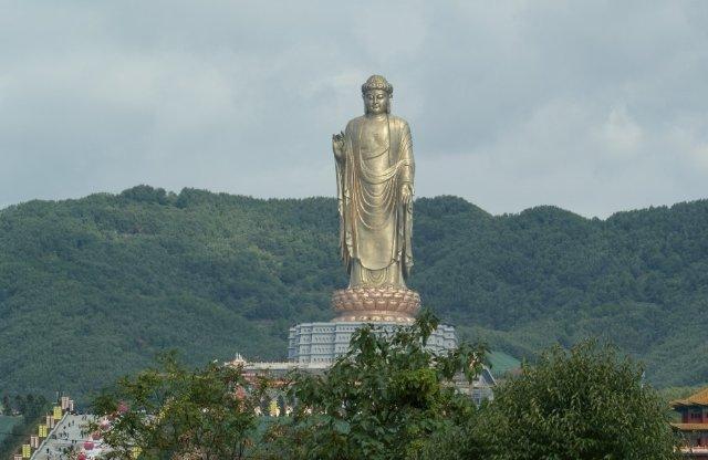 Towering deity (the Spring Temple Buddha, the largest statue in the world at 128m