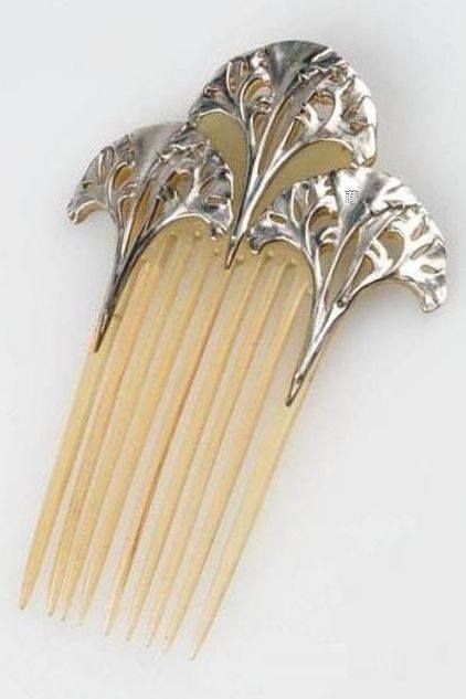 An Art Nouveau silver and horn hair comb, by Lucien Gaillard, Paris, Ca. 1906