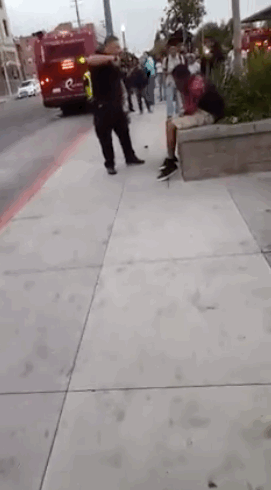 micdotcom:   Video shows 9 California officers beating a teen after jaywalking 