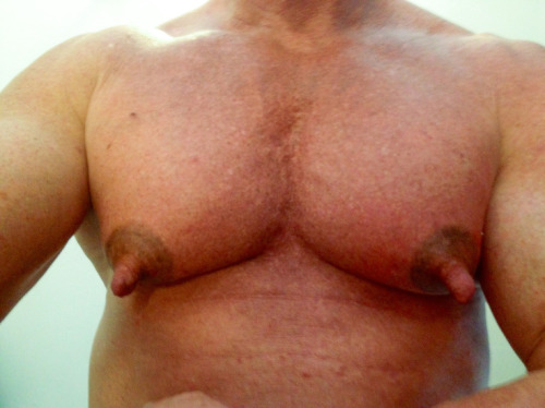 He is one very handsome man and with exceptional pecs and awesome nips!  WOOF