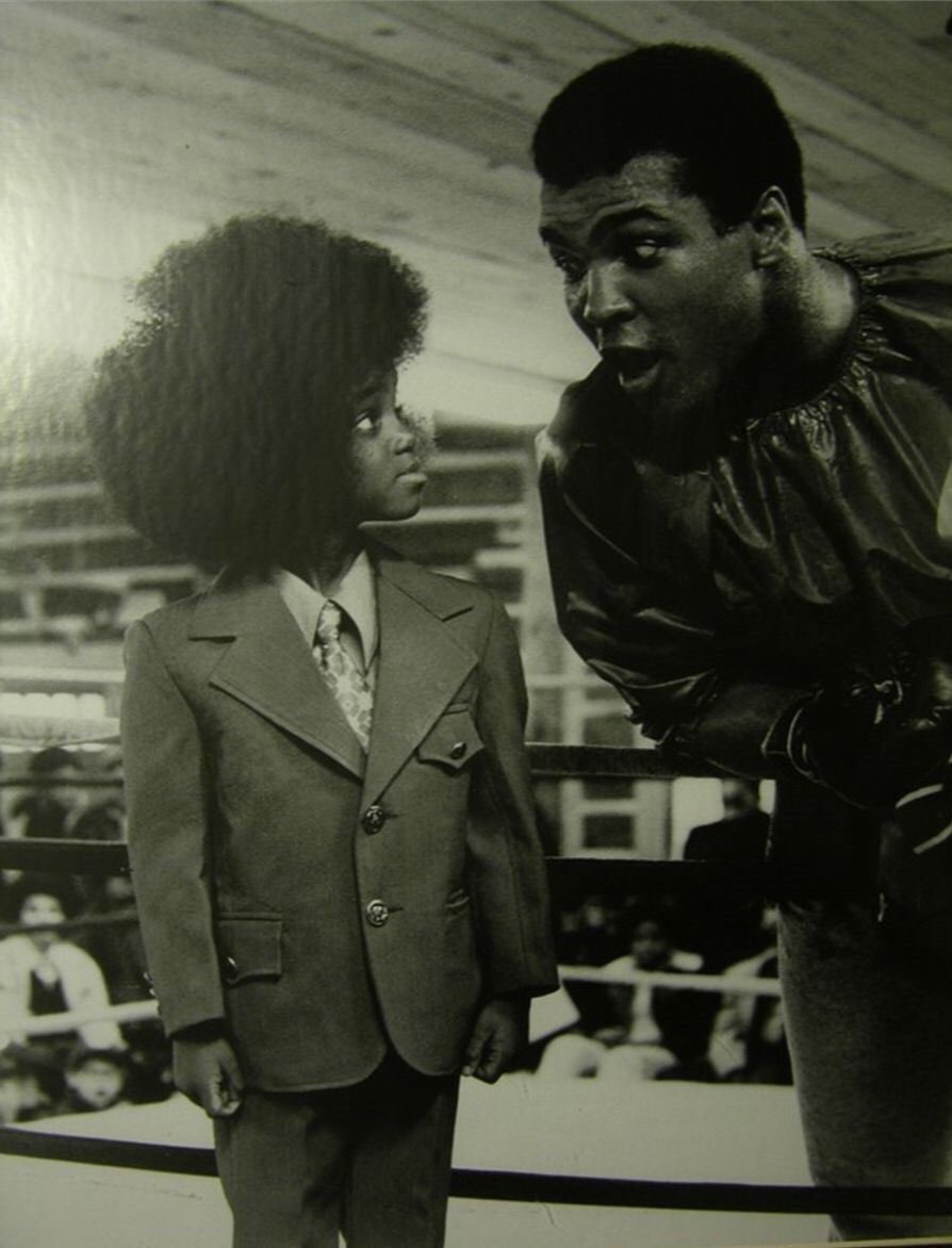 nicolezai:  zwamboobs:  A very young Michael Jackson and Muhammad Ali.   This is