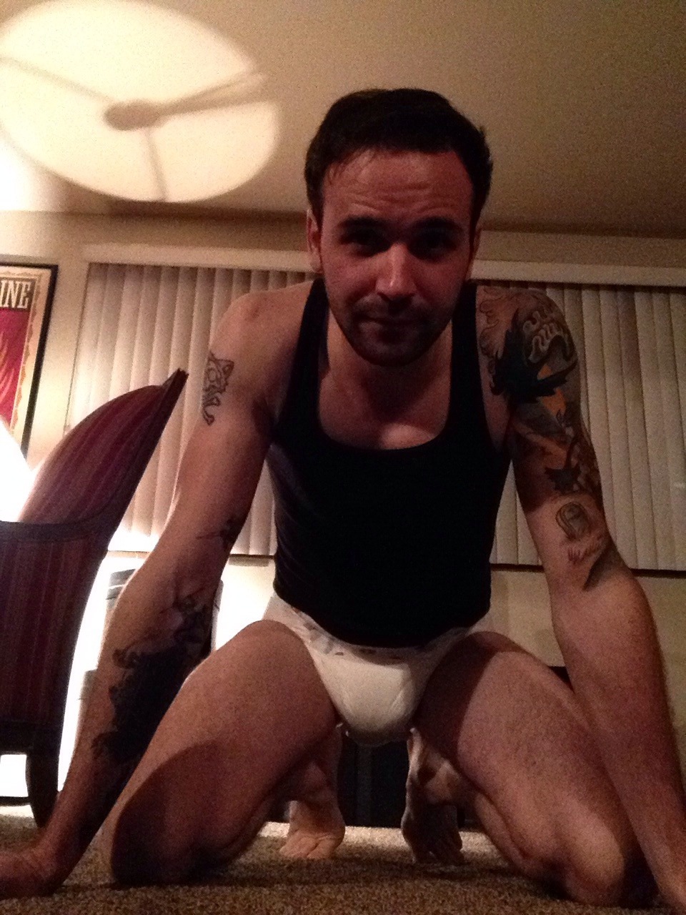 wettingmike:  In all my diapered and tattooed glory!  Very very sexy