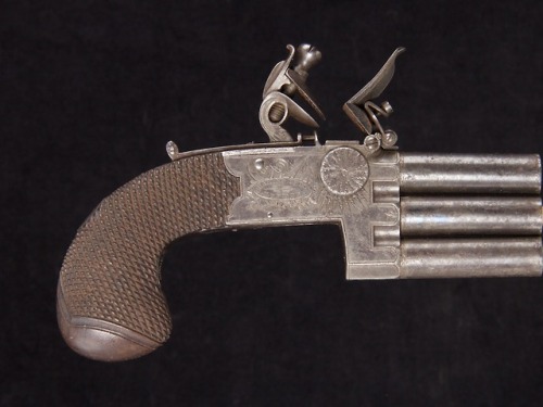 English three barrel tap action flintlock pocket pistol, circa 1800.from Michael German Antiques