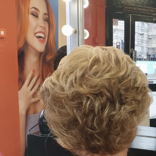 Even the poster girl is laughing about your perm!