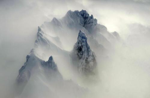 mirkokosmos:Isanotski Peaks, Alaska - by Chris Owens