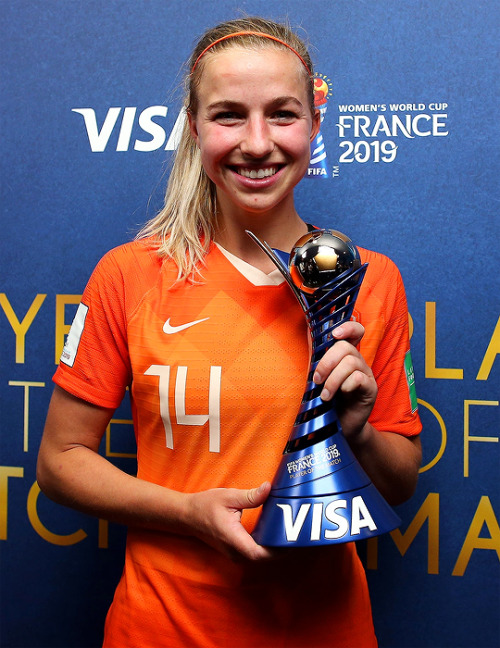 Jackie Groenen poses with her VISA Player of the match award after the match vs. Sweden