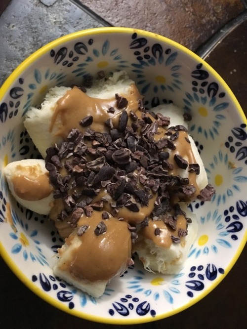 My favorite afternoon snack. A banana covered and natural peanut butter and a small handful of cacao