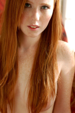 Pretty ginger redhead with long hair and