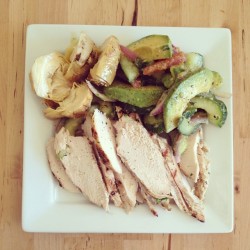reallyfitandthin:  alliegets:  No, I didn’t make this. I just sliced the chicken and threw everything on a plate.  Edited to add: this is as good as it looks, you guys. Grilled chicken; grilled, marinated artichoke hearts; and cucumber-avocado salad