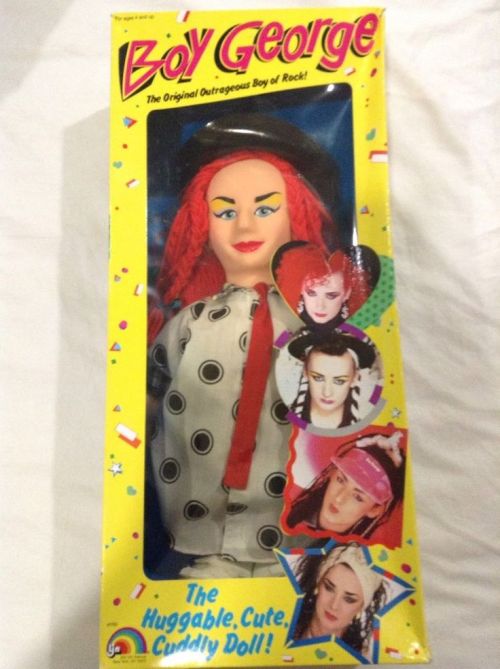 blondebrainpower:” Boy George The Original Outrageous Boy of Rock!.” … The doll comes with a blue microphone and a bright yellow Boy George doll stand, but the doll easily stands on its own without it. The doll was manufactured in 1984 by LJN under